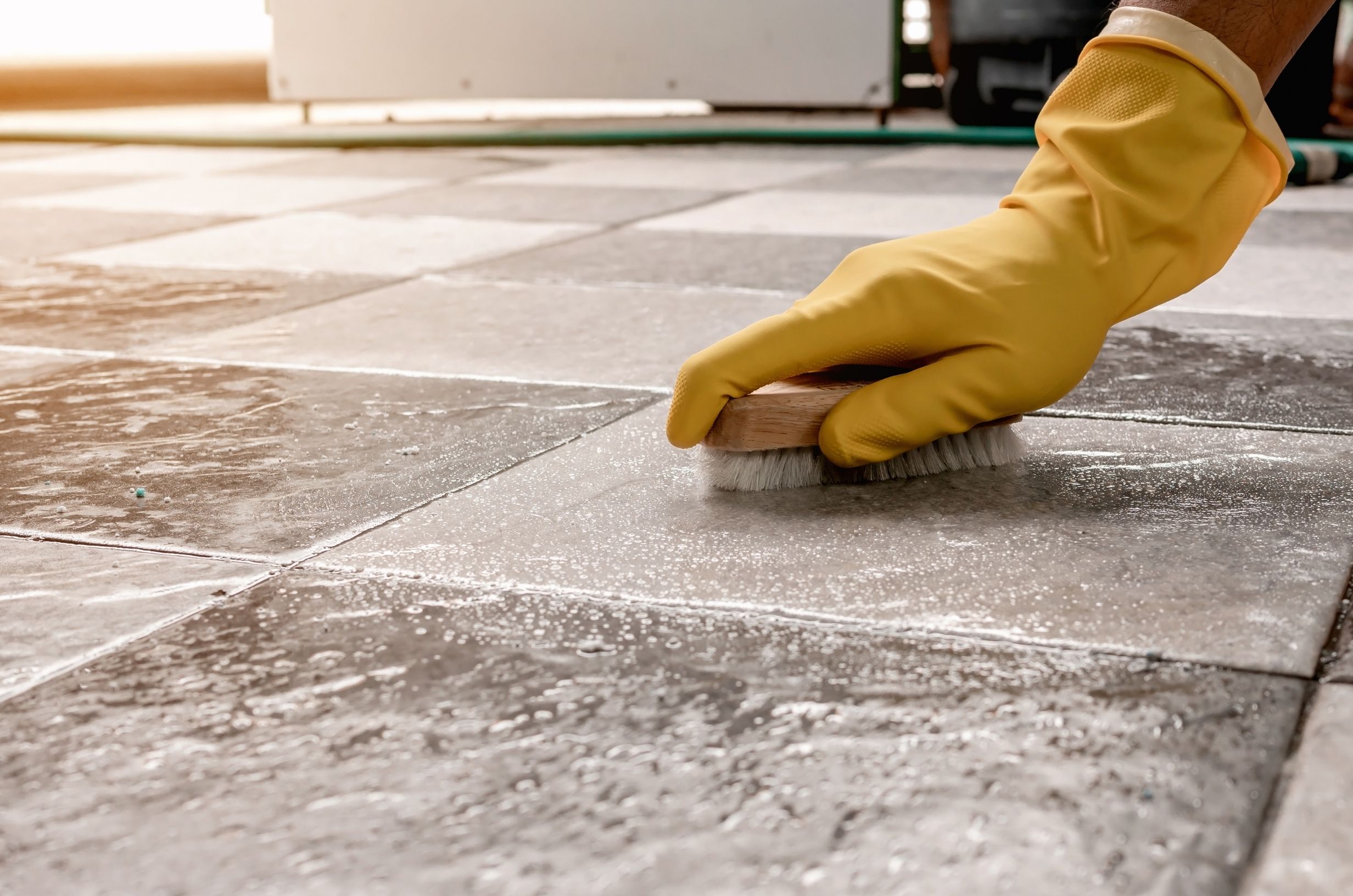 Grout-Restoration-Guy-Grout-Cleaning hand tile and grout cleaning on tiled floors